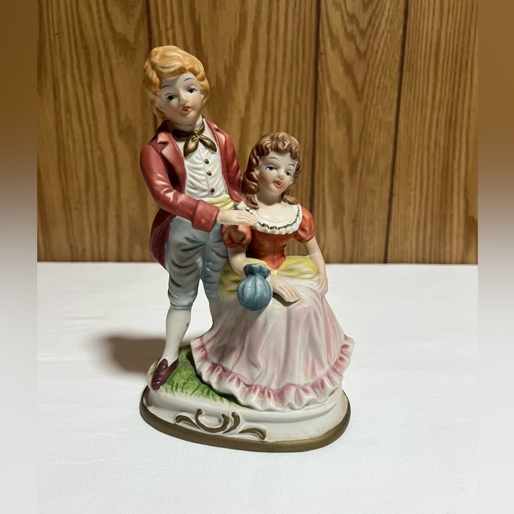 Vintage couple ceramic figurine.